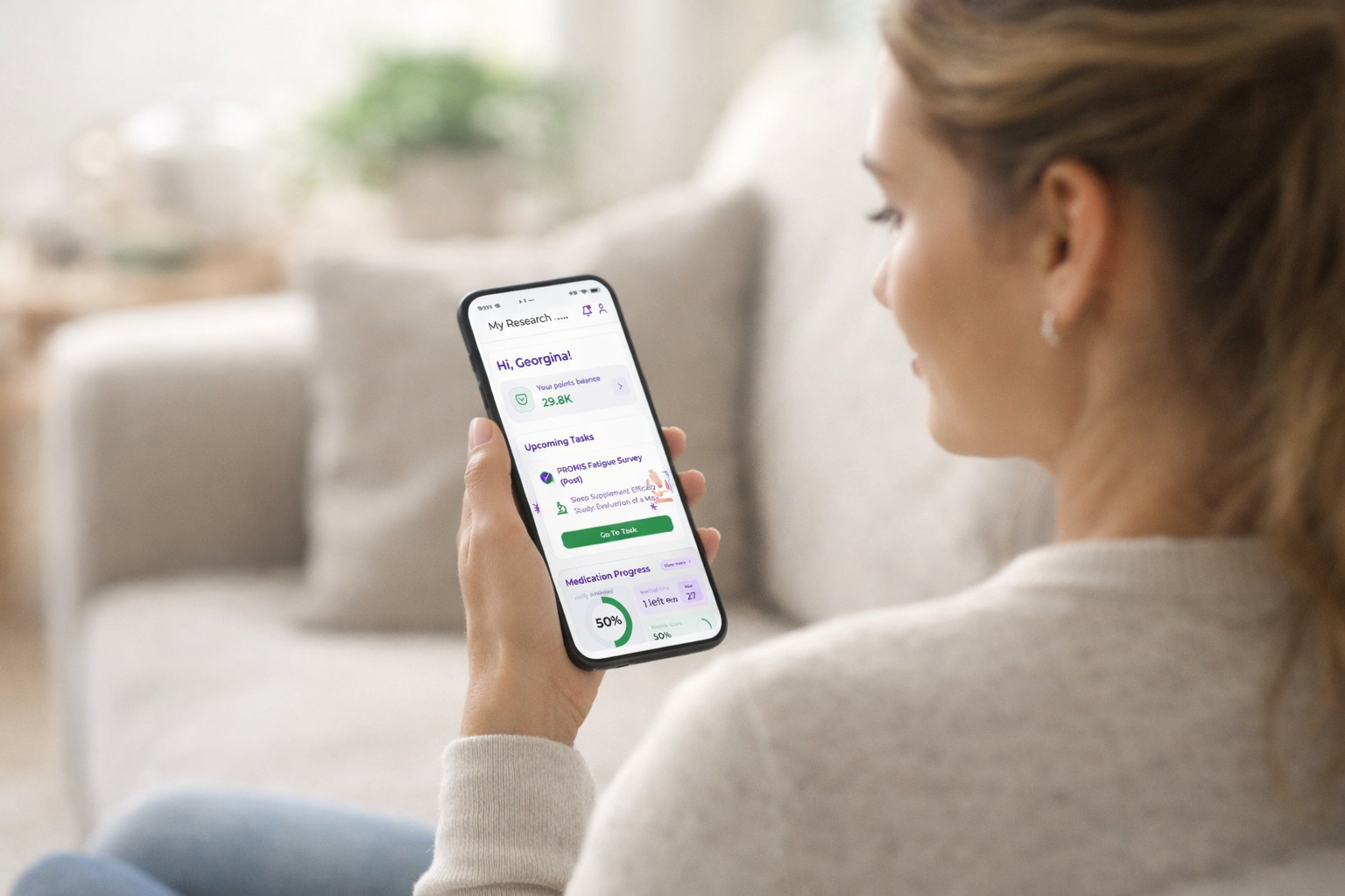 Person using the Aria health tracking app on their phone